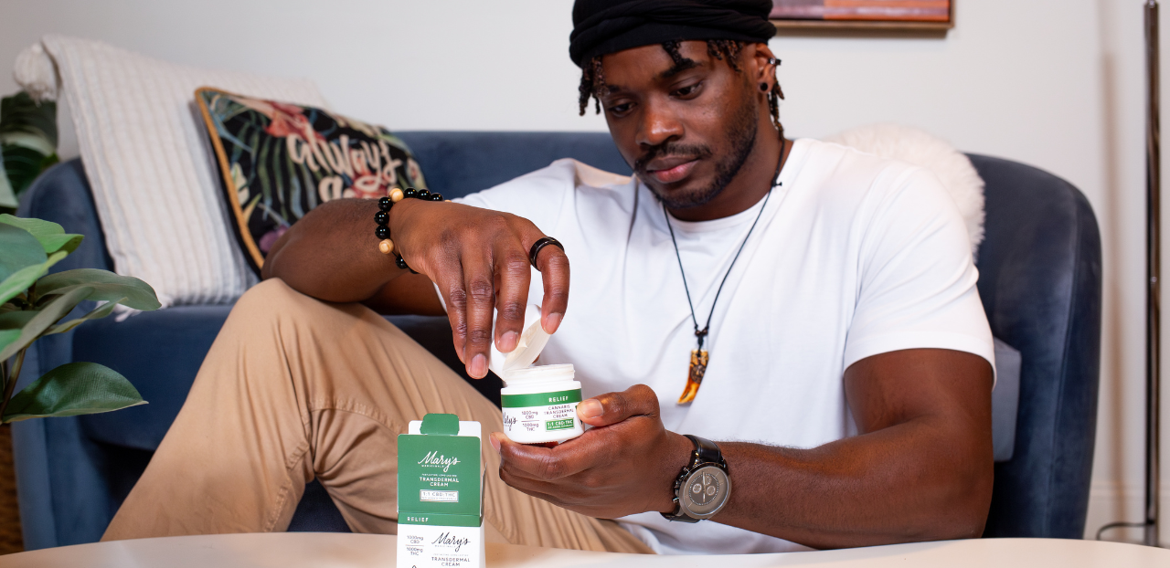 Man applying Mary's 1:1 Relief Transdermal Cream