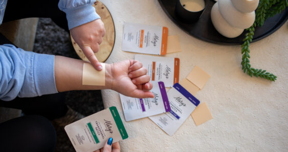 Applying transdermal patch on arm