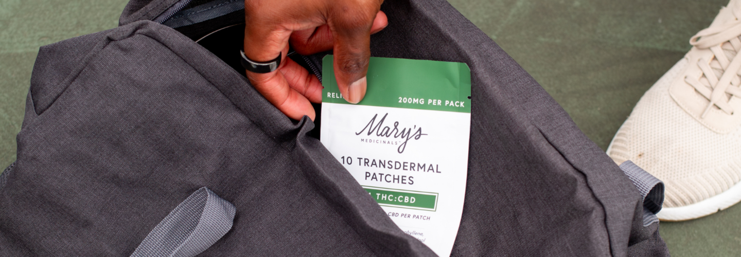 man taking Relief 1:1 Transdermal Patch out of gym bag