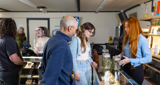 Customers exploring products at cannabis dispensary