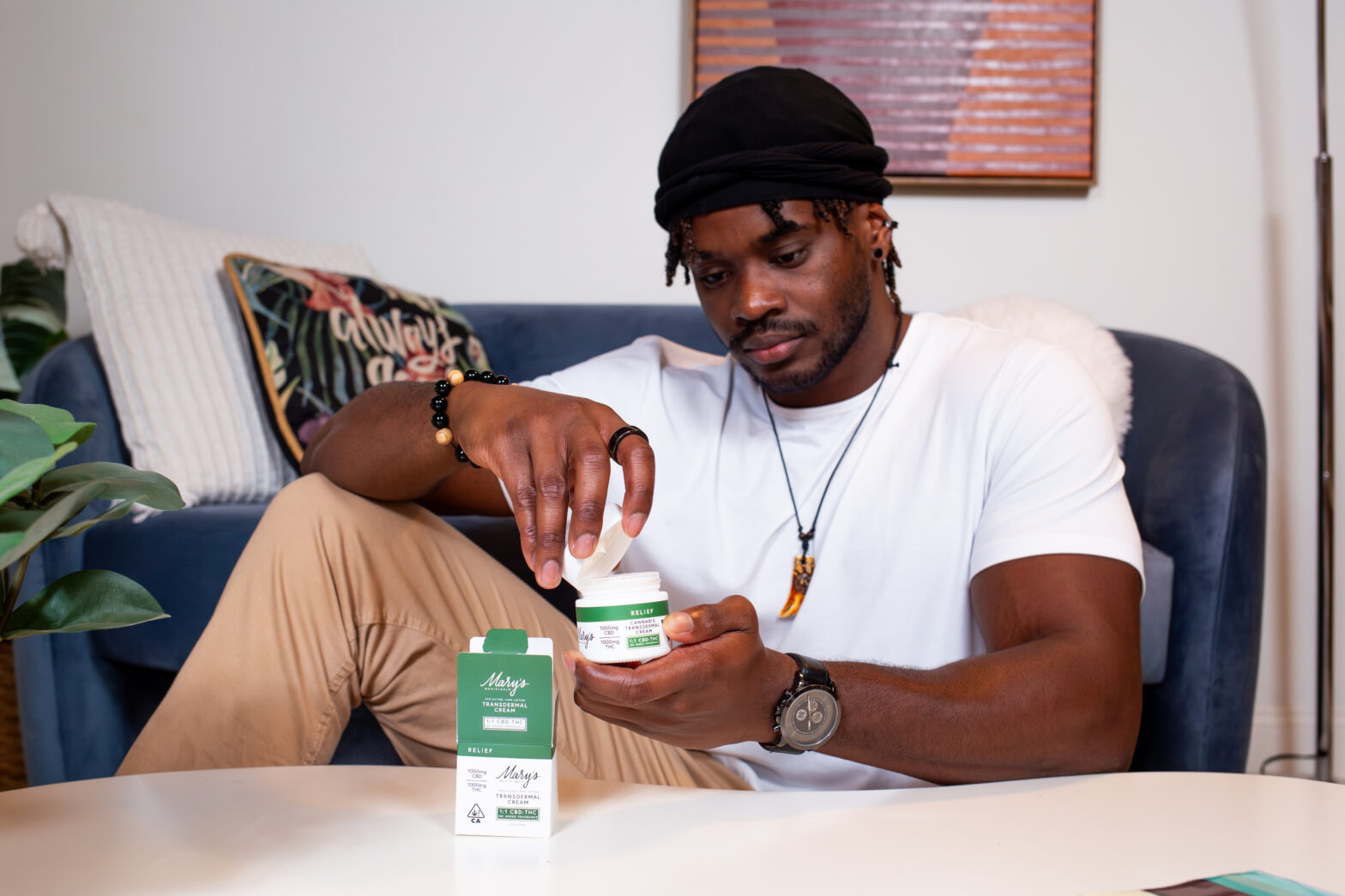 Man using topical cream for relief
