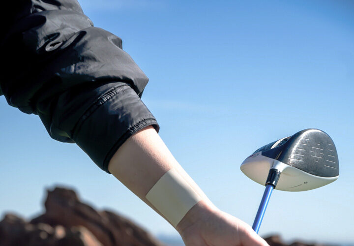 person playing golf with a relief 1:1 transdermal patch