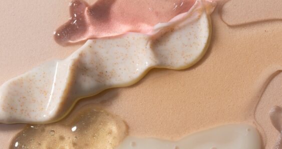 Skincare product textures on beige background