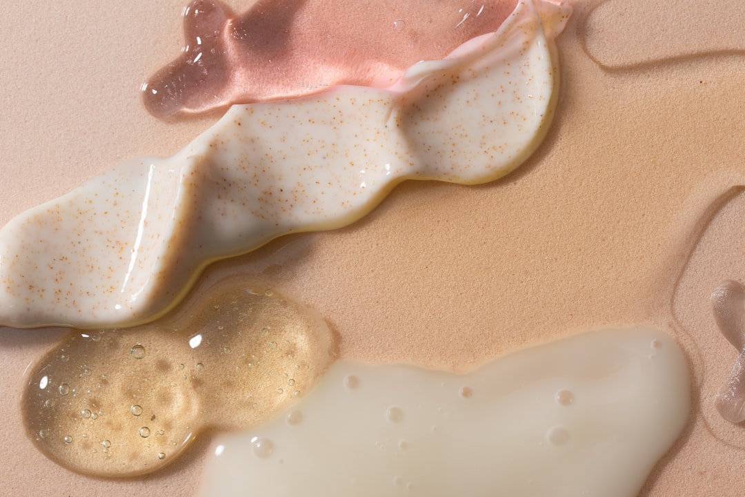 Skincare product textures on beige background