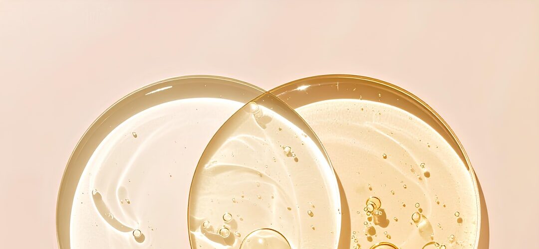 Skincare serums in petri dishes with bubbles