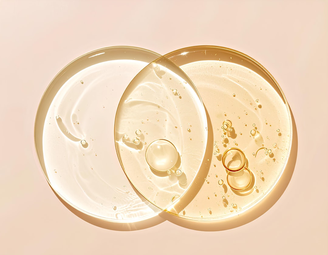 Skincare serums in petri dishes with bubbles