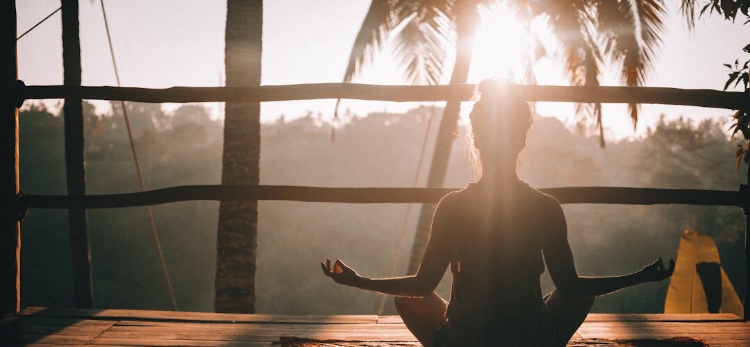 Sunrise yoga meditation outdoors tranquility