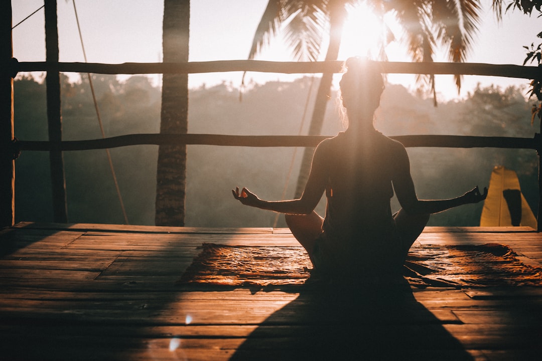 Sunrise yoga meditation outdoors tranquility