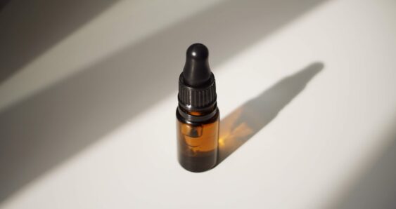 Amber glass dropper bottle with shadow