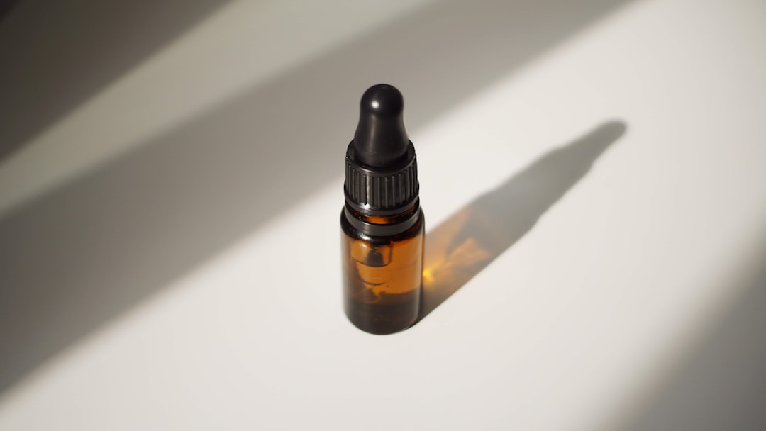 Amber glass dropper bottle with shadow